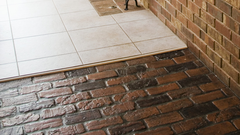 A sealed brick floor adorns the interior of a residential home.