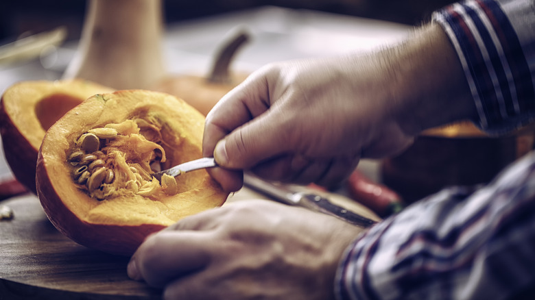 Carving a pumpkin