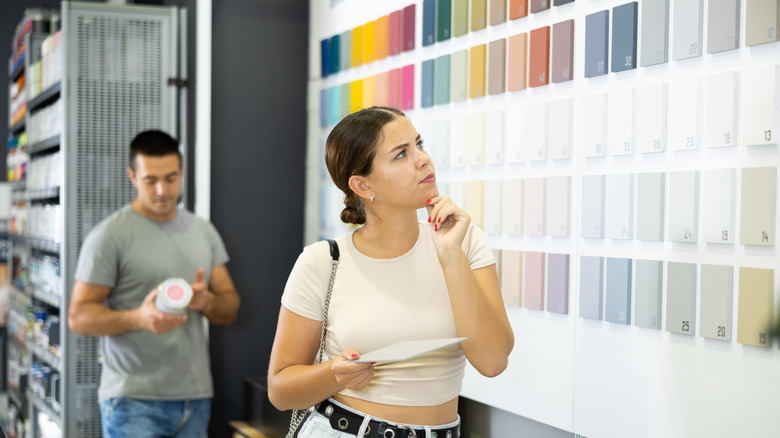 Couple shopping for paint colors