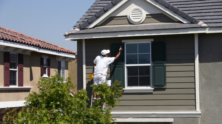 Someone who is painting their home black