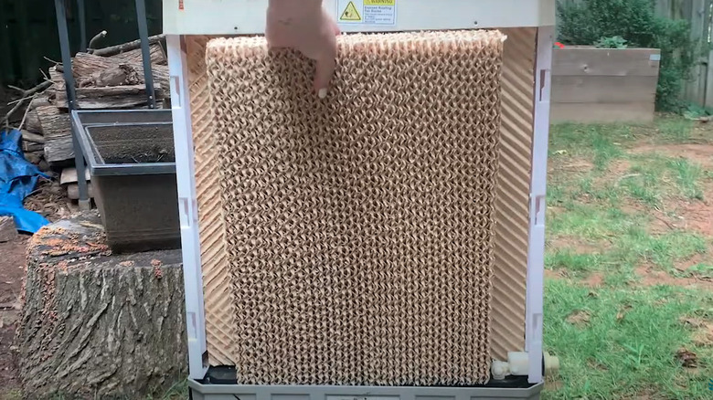 Replacing swamp cooler pads