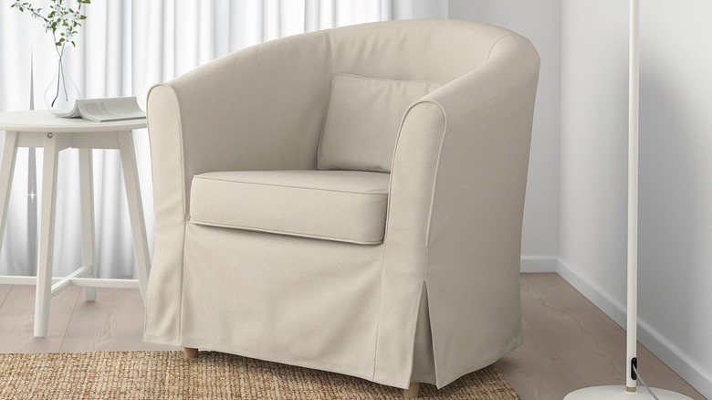 Classic white slip cover armchair