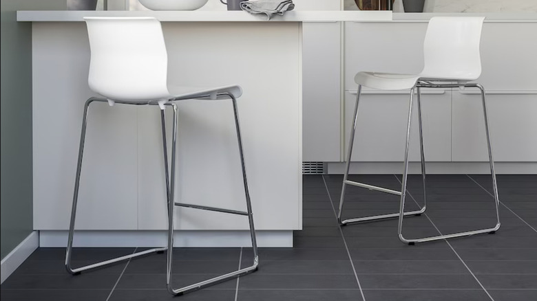 two white chrome bar stools