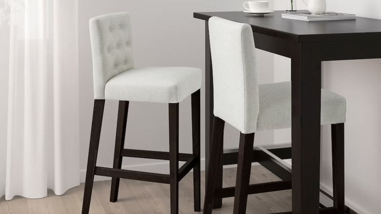 white upholstered bar stool