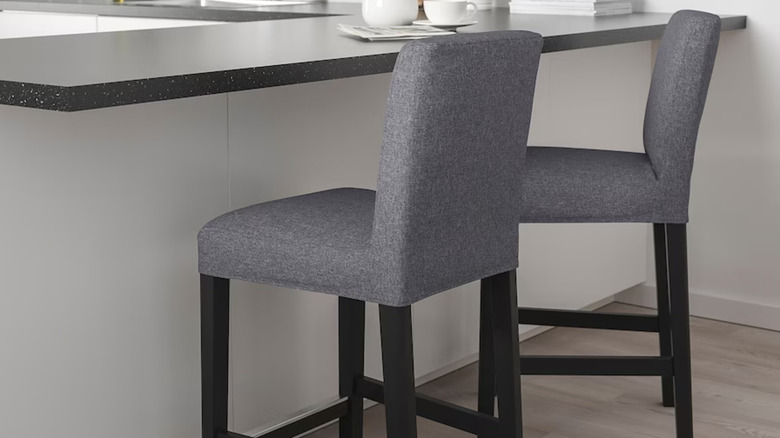 black stool with gray upholstery