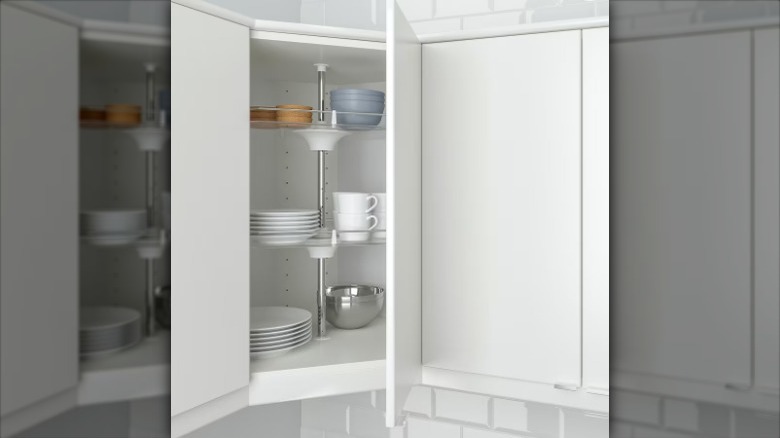 rotating cabinet with dishware