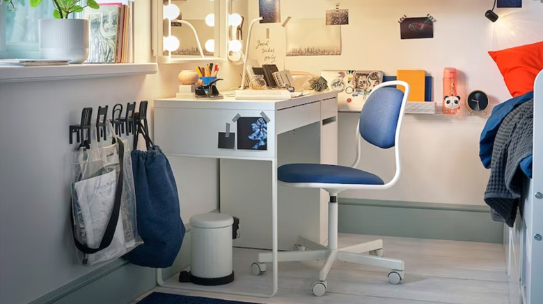 white desk with blue chair