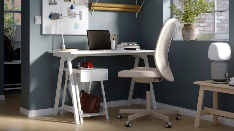 White desk with laptop