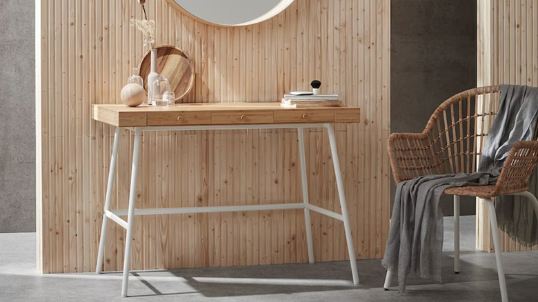 wooden desk with white legs