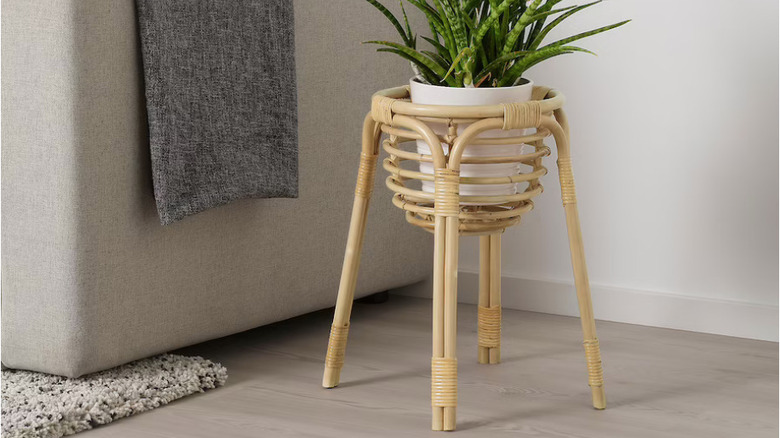 buskbo plant stand in living room