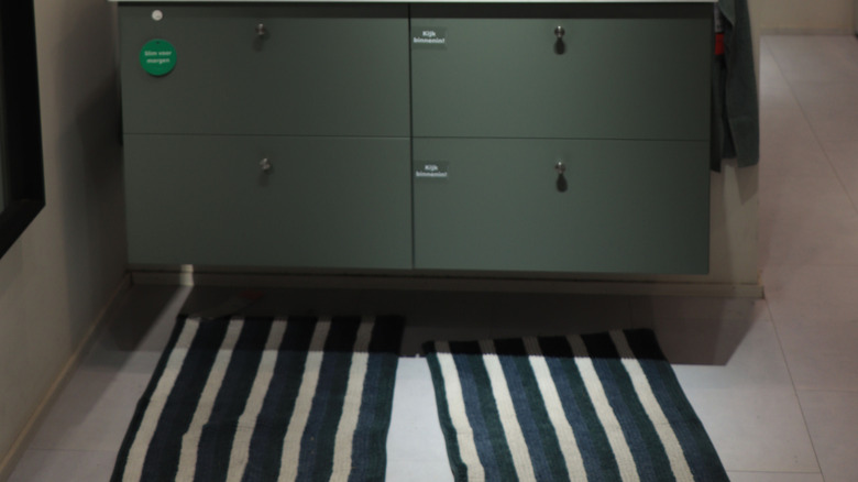 Dual IKEA bathroom washbasins in a showroom