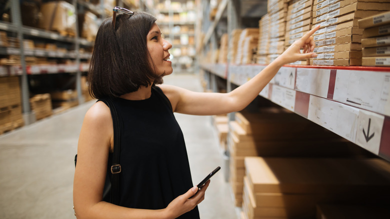 A woman shops for a closet system at IKEA