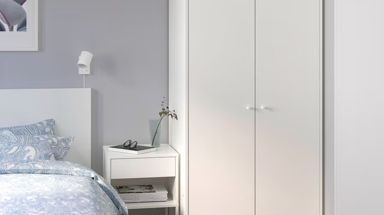 minimal white wardrobe with doors