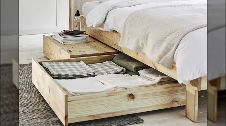 IKEA's GLAMBERGET bed with open drawer.