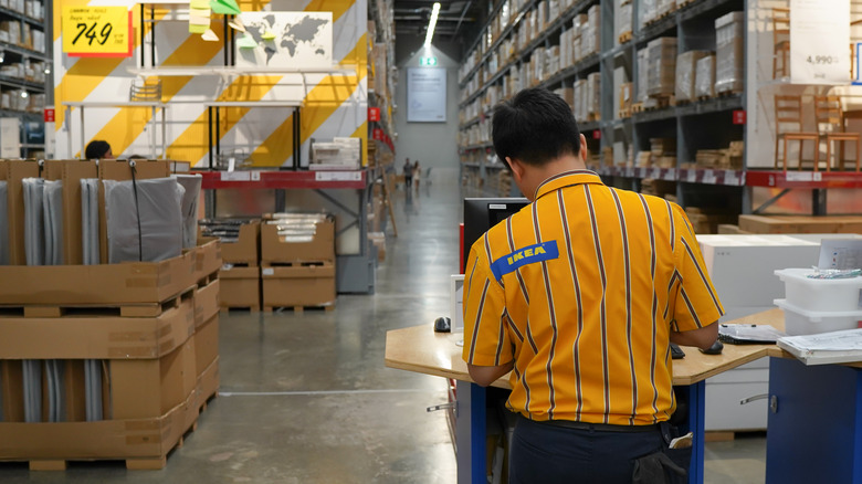 Ikea employee in yellow shirt