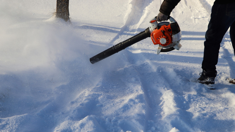 Clearing snow with a leaf blower