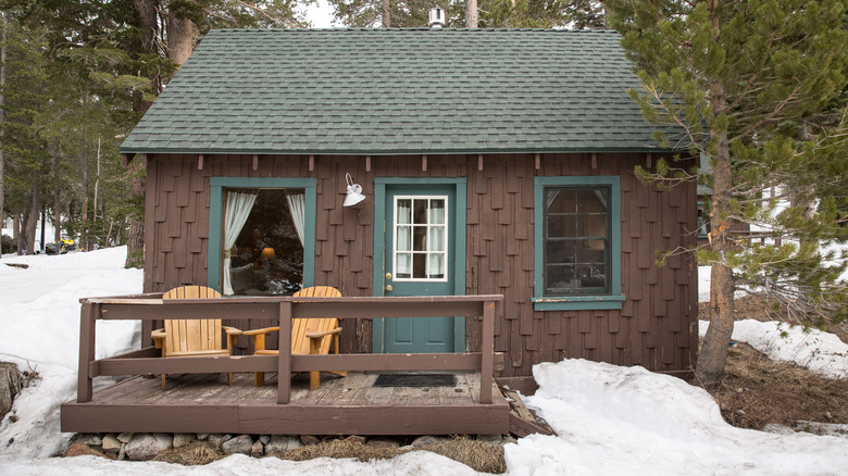 small cabin in the snow