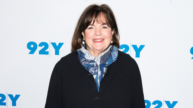 Ina Garten smiles on a red carpet