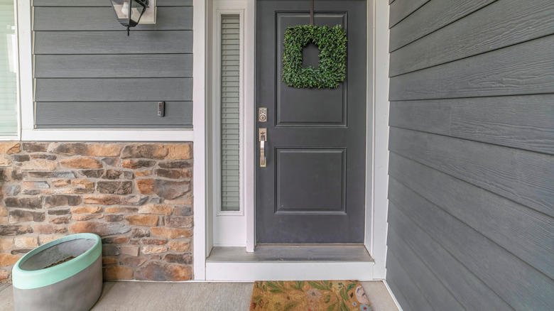 gray house with stone cladding