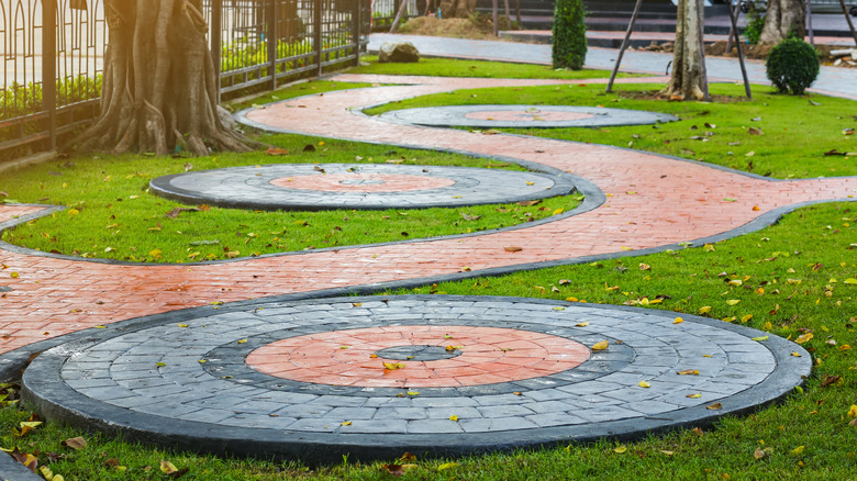 concrete patio with orange paint