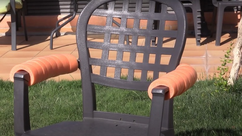 metal chair with pool noodle armrests