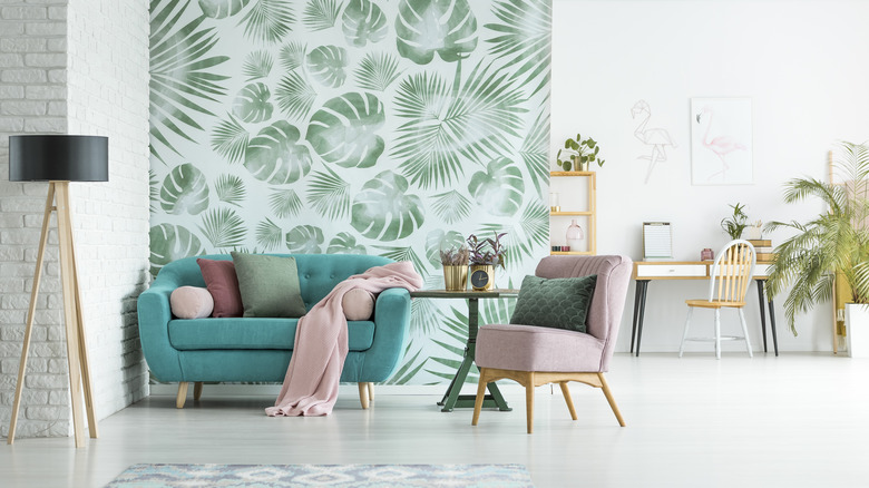 green palm wallpaper in living room