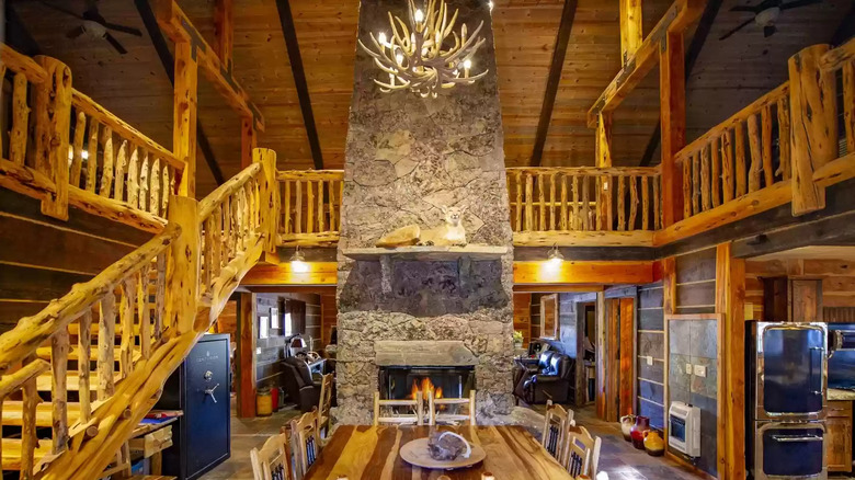 log cabin with stone fireplace