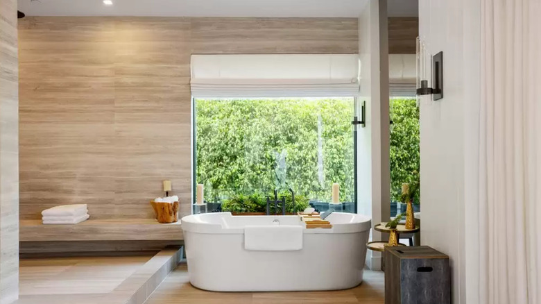 bright bathroom with large window