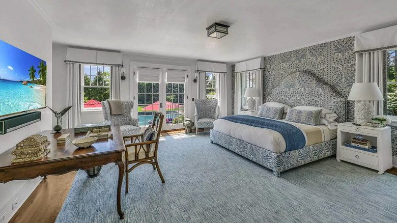 bright bedroom overlooking pool