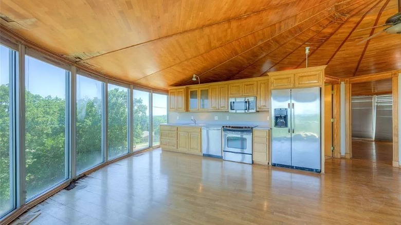 large kitchen with wooden celing