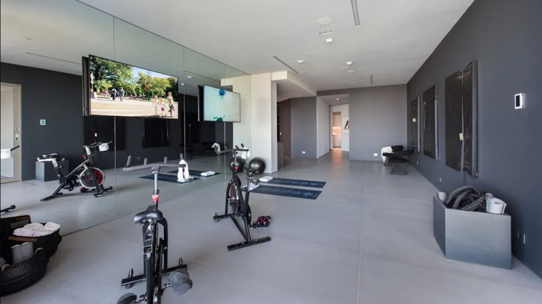 indoor gym with televisions