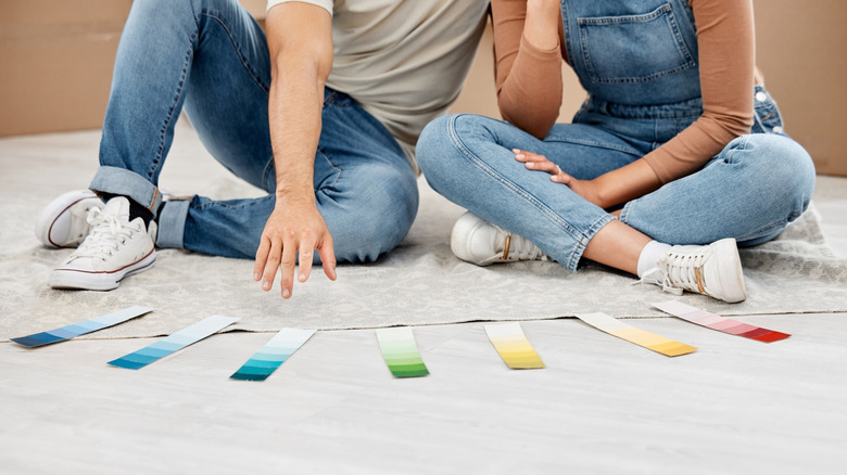 Couple choosing paint colors