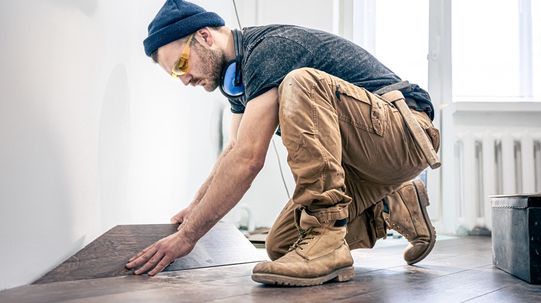 Installing hardwood over laminate