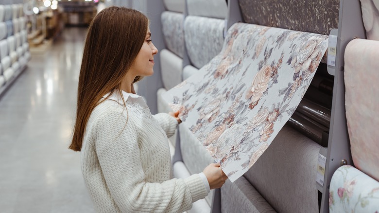 Person buying wallpaper