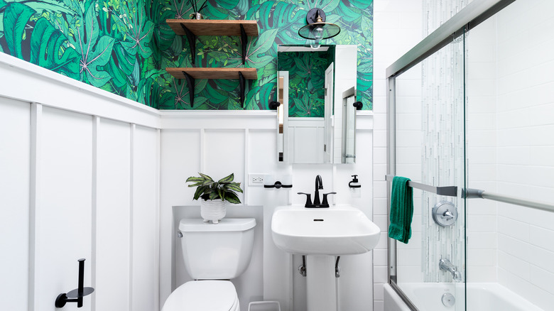 green wallpaper in bathroom