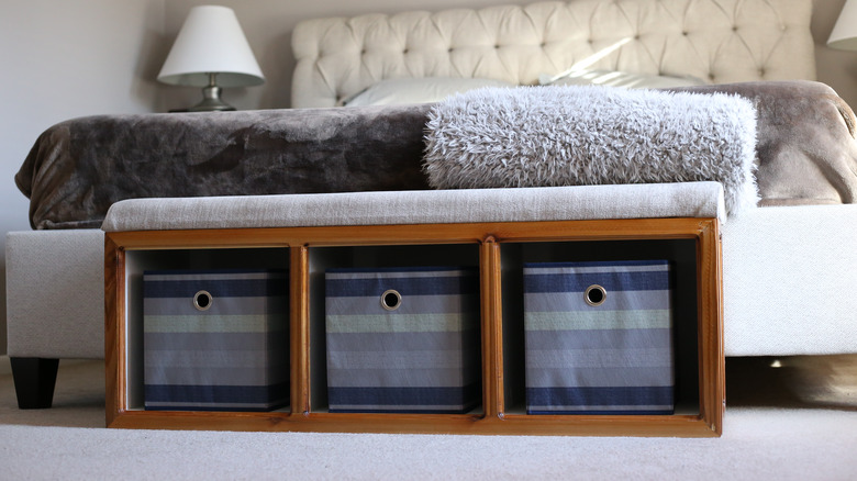 three containers in wood bench 