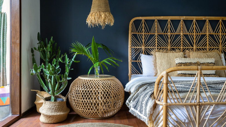 bohemian bedroom with rattan furniture