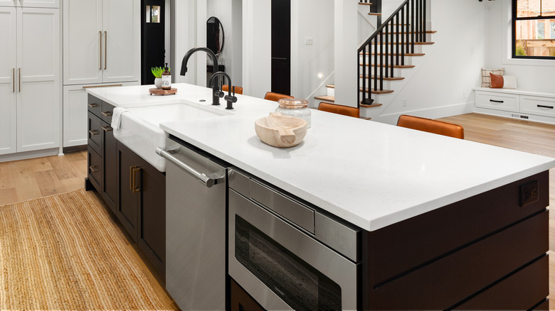 Kitchen island with sink and appliances