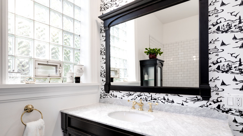 Vanity with patterned wallpaper