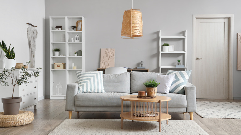 A Scandinavian living room with a round coffee table