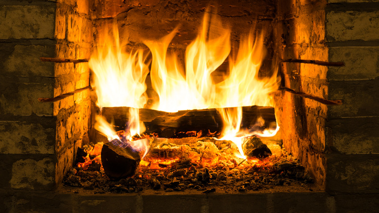 fire in stone fireplace