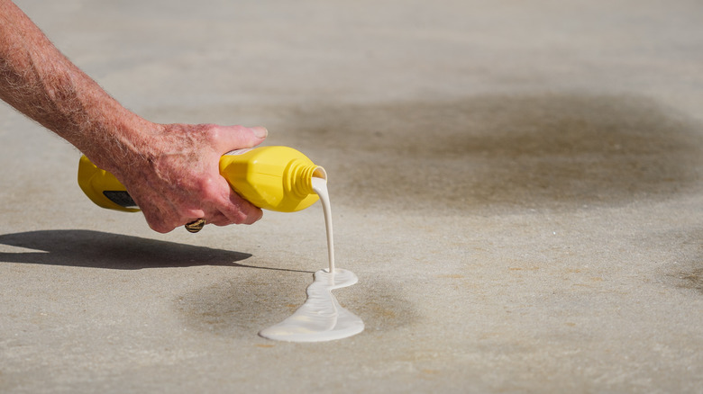 Cleaning driveway with store bought cleaner