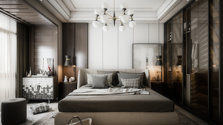 White chandelier in bedroom