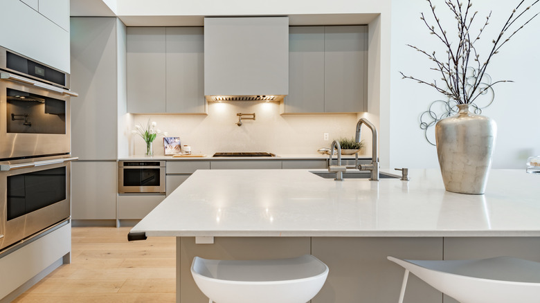 Modern kitchen with light gray phenolic resin countertops