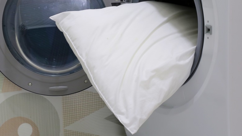 White pillow in dryer