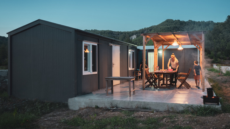 Family on tiny house patio