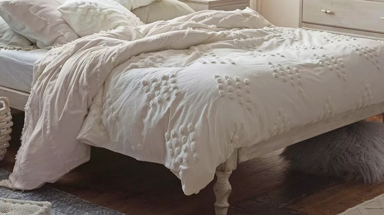 Urban Outfitters white bed