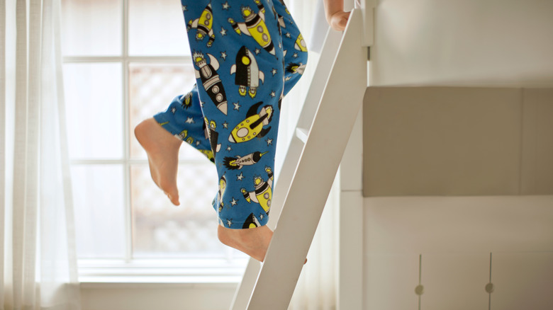 child climbing bed ladder