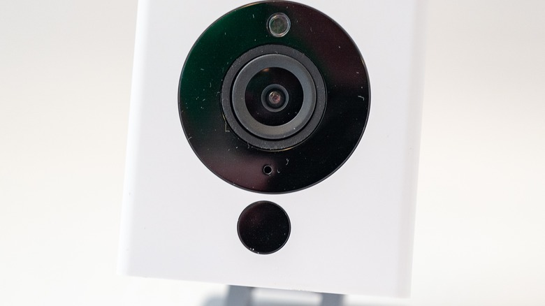 Wyze security camera on white background