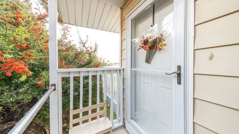 Porch with glass storm door